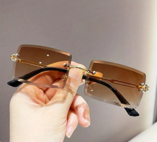 Brown color rimless retros