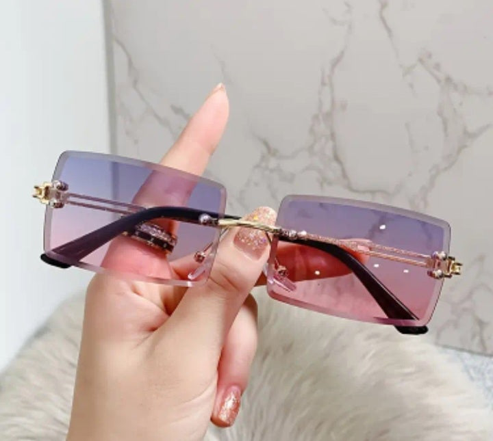 Purple-pink rimless retro glasses